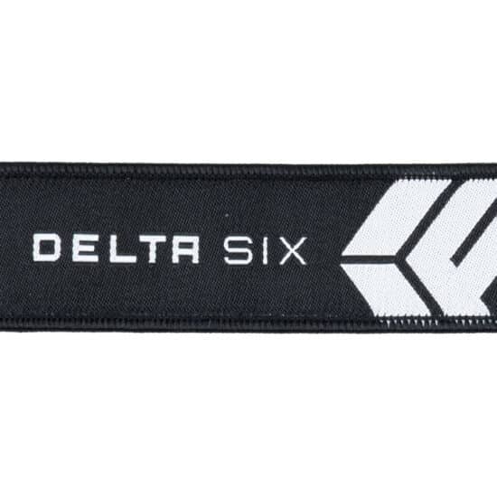 DELTA_SIX_Schluesselanhaenger_mit_Logo_schwarz_weiss_close-jpg