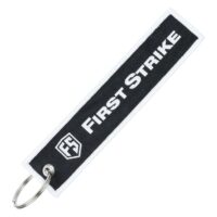 First Strike Schlüsselanhänger mit Logo (weiss/schwarz)